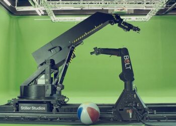 Two robots wishing Pixar’s Luxo Jr. a happy birthday